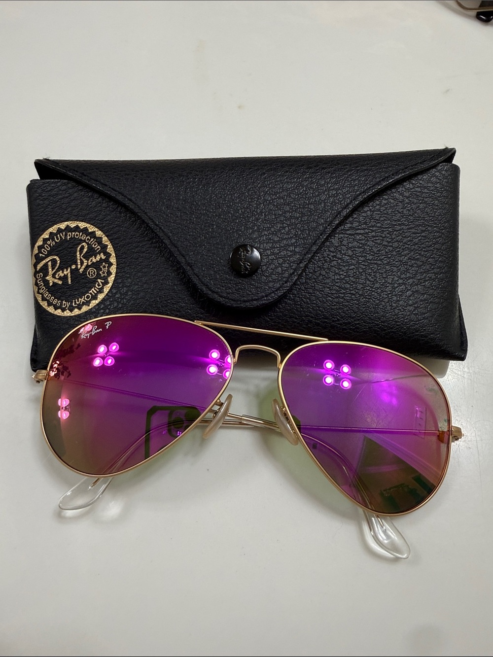 Ray-Ban Women’s Gold Frame Aviator Sunglasses with Purple Mirrored Lenses